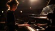 © Katerina - Woman playing the piano at an orchestra performance