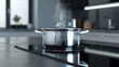 Concept of cooking in a modern kitchen pan on an induction stove. Copy space