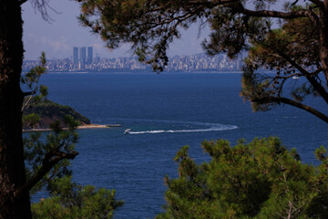 Wall Mural - Cityscape View from the water to buildings in the city of Istanbul in public places