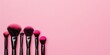 on the right, professional makeup brushes, pink background, horizontal banner for make-up, beauty and cosmetology, free space for text