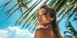 portrait of a beautiful girl against a background of tropical plants, palm leaves, spa concept, beauty and cosmetology, travel and beach holidays, blue sky
