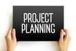 Project Planning - discipline addressing how to complete a project in a certain timeframe with defined stages and designated resources, text concept on card