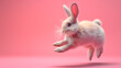 A happy white Easter bunny jumping on the pink background. Easter design concept with copy space