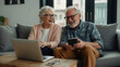 Fröhliches Seniorenpaar genießt gemeinsame Zeit mit Technologie zu Hause