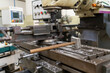 © ZenitX - Metal working milling machine with a hammer in a workshop