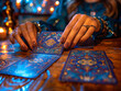 © Svetlana - The witch lays out tarot cards and predicts fate in a mystical atmosphere with candles