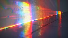 Blurred Rainbow Light Refraction Texture Overlay Effect For Photo And Mockups. Organic Drop Diagonal Holographic Flare On A White Wall. Shadows For Natural Light Effects 