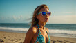 beautiful woman wearing a bikini and sunglasses enjoying a leisure day at the sunny beach