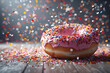 tasteful donuts with pink topping and colorful sparkles