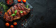 top view grilled steak with pepper herbs and tomatoes on stone black surface, flat lay with copy space, roast beef restaurant concept