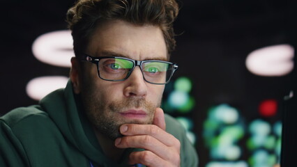 Man coder looking computer making system research workplace closeup. Guy reading