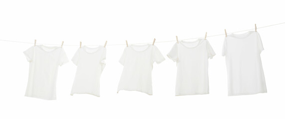 Sticker - Many t-shirts drying on washing line isolated on white