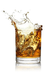 Sticker - Whiskey splashing out of glass on white background