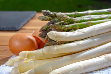 Bunch of fresh raw white and green asparagus vegetables, new season of asparagus