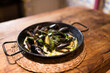 © Ibai Acevedo/Stocksy - Delicious mediterranean steamed mussels