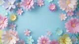 Fototapeta Maki - Pastel colored paper flowers on light blue backdrop for spring decorations. Handmade paper floral designs for DIY crafts and home decor.