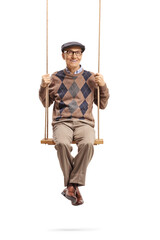 Sticker - Elderly man sitting on a wooden swing and smiling