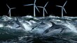 a group of dolphins swimming in the ocean next to a row of wind turbines in the background of a black sky.