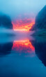 Roter Sonnenaufgang über einem See mit Nebel, Berglandschaft, Außenaufnahme, Spiegelungen im Wasser