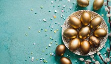 Festive Easter Background With Painted Golden Decoration On Easter Eggs On Beautiful Turquoise Table Top View And Fashion Flat Lay Style