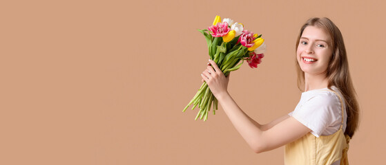 Sticker - Happy young woman with bouquet of beautiful tulips on brown background