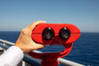 © Branislava Zivic Zrnic/Stocksy - Viewpoint red binoculars on a cruise ship