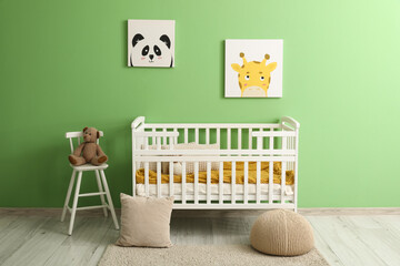 Poster - Interior of modern baby room with crib near color wall