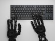 © CANDID =X=/Stocksy - Ai robot typing on human keyboard