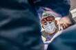 © VICTOR TORRES/Stocksy - Doctor in magnifying glasses performing surgery at clinic