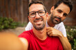© Lupe Rodríguez/Stocksy - ugc of gay couple taking a selfie
