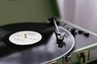 © Oleksii Syrotkin/Stocksy - Vinyl plate record player audio technology music entertainment design