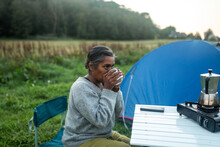 Middle Aged Indian Woman Camping In Nature
