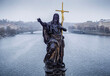 © Amos Chapple/Stocksy - Statue of St. John the Baptist in snow