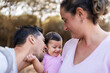 © Raul Navarro/Stocksy - Happy Family Celebrating with Smiles and Love