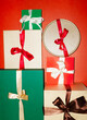 © Colour Laboratory/Stocksy - Tower of colorful Christmas presents with hard direct flashlight