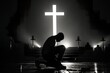 An introspective man kneels before a towering cross, embodying reverence, devotion, and reflection.
