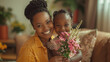 A woman cradles a child in one arm while holding a vibrant bouquet of flowers in the other, Black Mother with child, Mother`s Day Concept