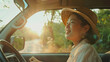 Asian women travel relax in the holiday. Traveling by car park. happily With nature, rural forest. In the summer. Woman driving a car traveling happily.