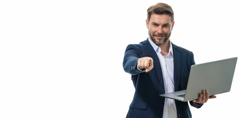 Freelancer man working on laptop in studio. Man freelancer checking laptop. Serious freelancer writing text on laptop. Male freelancer employee using laptop. Freelance and business. Banner, poster.