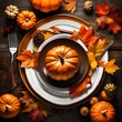 Serving for Thanksgiving dinner with napkin, cutlery and pumpkins top view. Autumn table setting.  