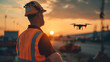 Drone Operator: An Engineer Skillfully Piloting a Drone in a Safety Vest