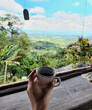 © Screen moment/Stocksy - cup of coffee with a beautiful view