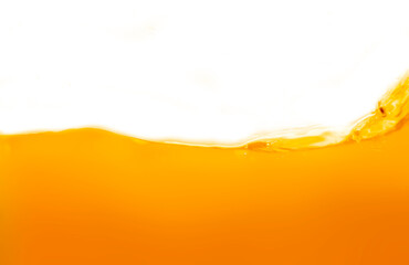 Close up bright orange juice texture for health and nature waves