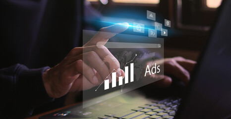 Poster - Online marketing and website advertising concept. Young man using laptop with digital marketing strategy analysis to promotion of products or services through digital channels.