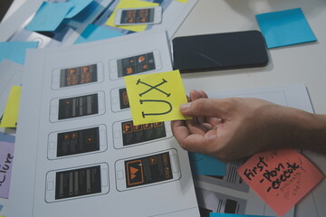ux Graphic designer creative sketch planning application process development prototype wireframe for web mobile phone . User experience concept.