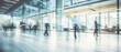© ND STOCK - Business people walk in a large office lobby against a cityscape background. Motion blur effect, bright business workplace with people in walking in blurred motion in modern office space