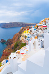 Wall Mural - View of Oia town on Santorini island in Greece. Travel mediterranean aegean of traditional cycladic Santorini white houses