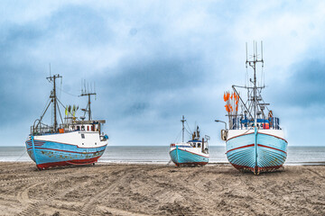 Wall Mural - Thorup beach with active fishing vessels cutters, in Thy, Denmark