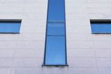 Fototapeta  - Abstract architecture. Close up of a modern office facade.