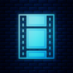 Poster - Glowing neon Play Video icon isolated on brick wall background. Film strip sign. Vector